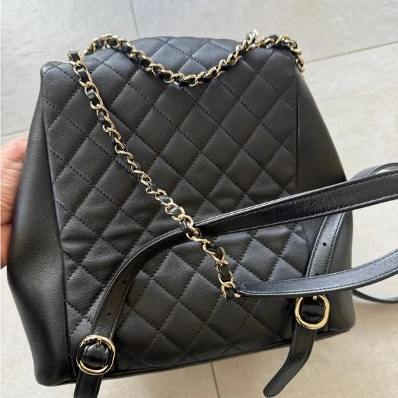 CHANEL Black Quilted Backpack with Gold Accents - Picture 3 of 9
